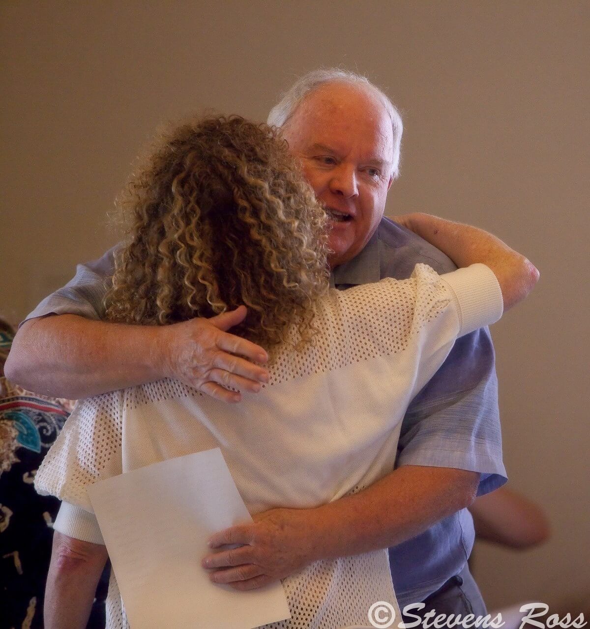 Steve hugging a friend